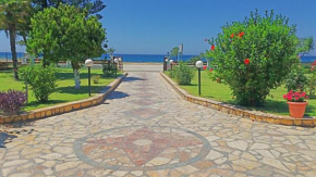 Отель Raptis Apartments  Лигия